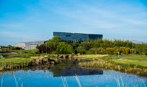 Dalton Cumbrian Facility viewed from field outside on a sunny day